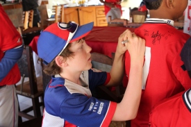 Signing a Cuban player's uniform after dinner.