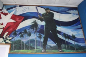 A painting of Cuban leader Fidel Castro playing baseball at the Estadio Latinoamericano.