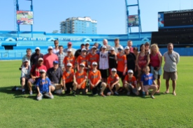 The team poses for a photo in the outfield of the Estadio Latinoamericano, home of the Havana Industriales and the Cuban National Team. The stadium, which seats 55,000, is the largest in the country, and was home to the baseball game which President Barack Obama attended.