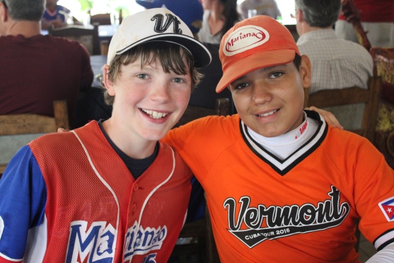 Vermonter Andrew Goodrich (left), with a Cuban player after exchanging jerseys.